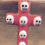 Day of the Dead cross with skulls