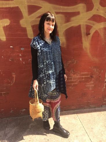 Printed indigo top by PEACOCK WAYS, $115, and red and blue printed skirt by CULTURE SHOP, $43