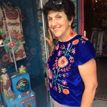 Blue velvet blouse embroidered with ribbon, $68