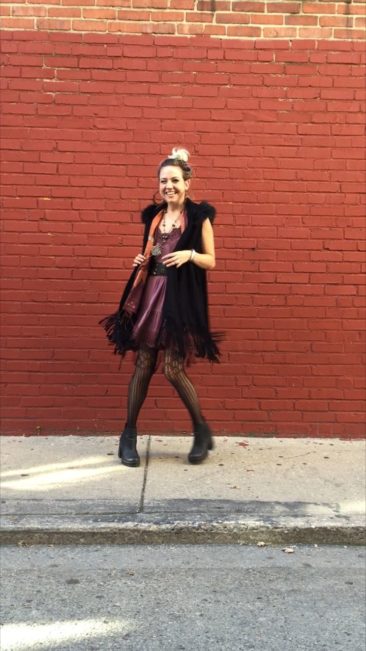 Woven fur hooded fringe vest, $70; Jersey lace dress by POL, $43; Silver chachal necklace ca 1864, $650