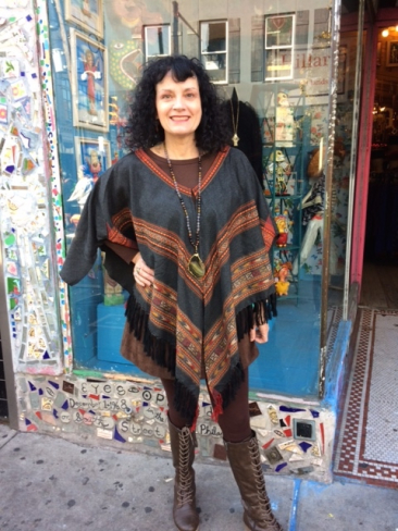 Woven gray poncho with fringe by FASHION FUSE, $58; sliced agate necklace, $45