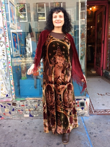 Long brown velvet Buddha dress by TAN, $70; red velvet lace-fringed shawl by J&X NY, $44.50