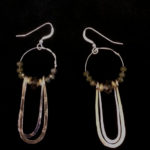 Circular earrings with crystals, $74