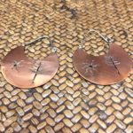 Copper Mapuche earrings with earth symbols