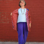 Reversible Malibar jacket by MARKETPLACE, $148; FLAX fresh top in aqua, $72; FLAX floods in viola, $68; Tibetan coral and turquoise earrings, $28; Guatemalan antique coin necklace, $315.